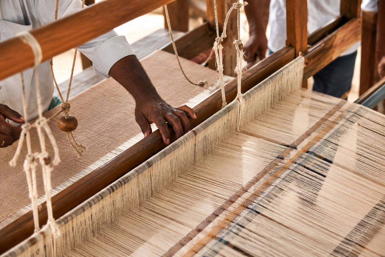 Traditional handloom weaving in motion - Tradition in motion.